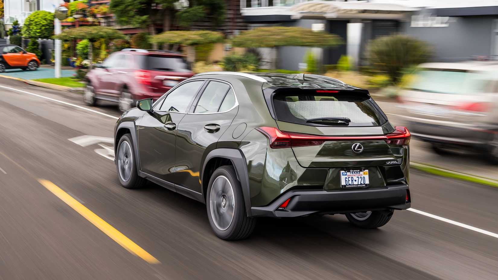 Rear 3/4 action shot of a 2019 Lexus UX