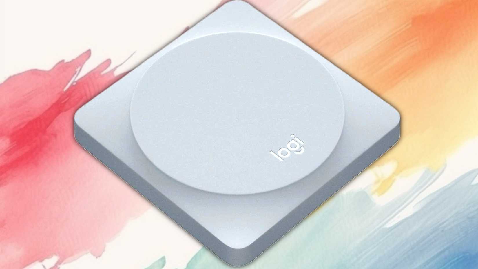 Logitech pop button on a painted background