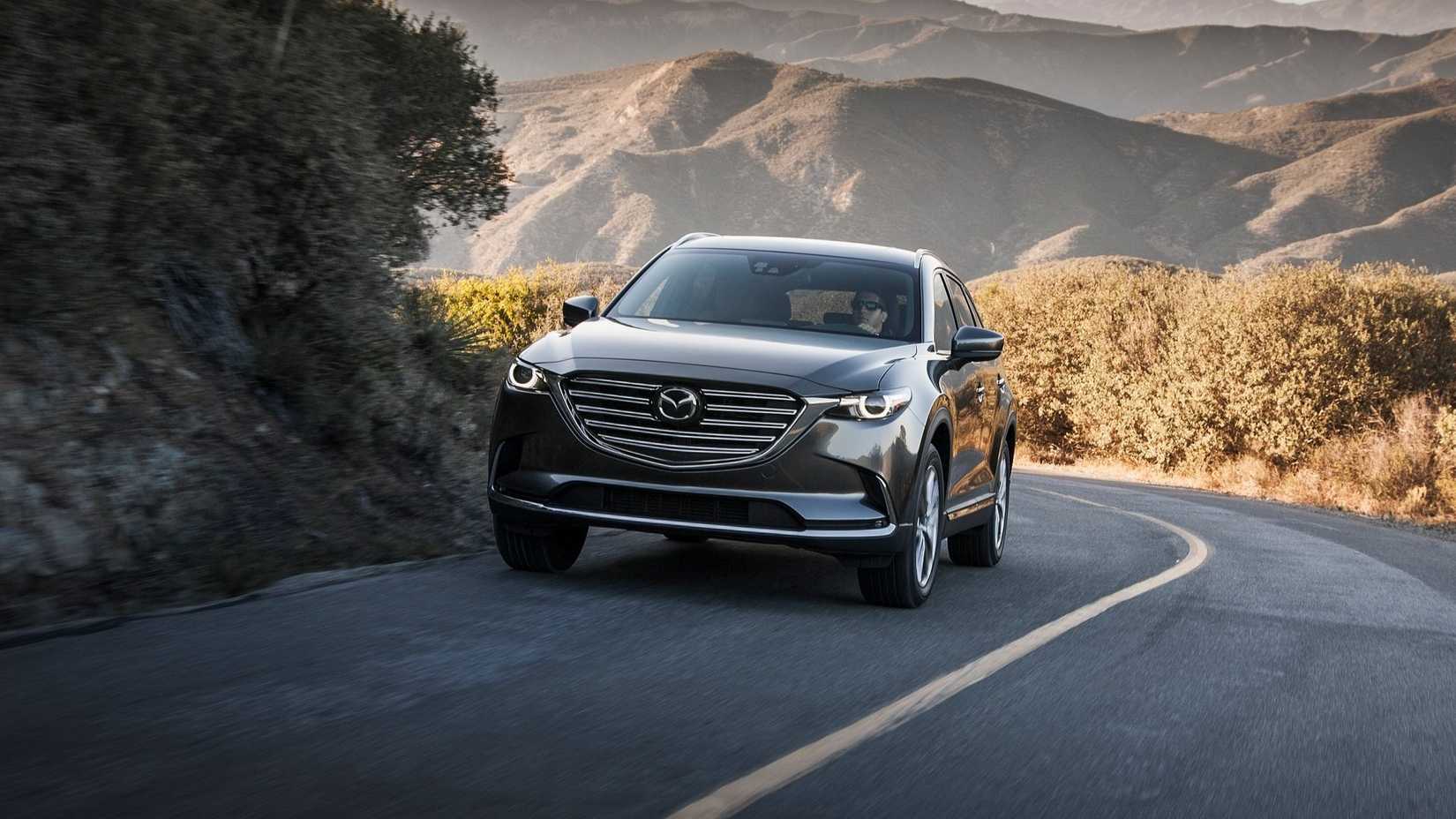 Front 3/4 action shot of a 2016 Mazda CX-9 