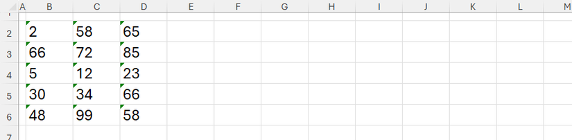 Numbers stored as text in an Excel spreadsheet, with green tags in the top-left corner of each affected cell.
