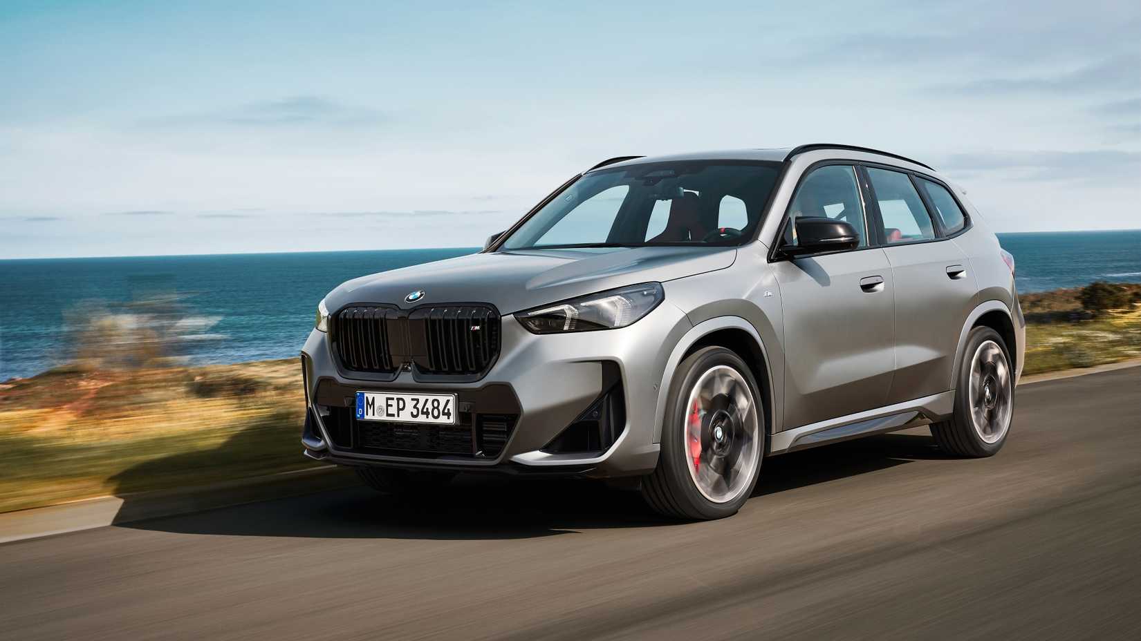 Front 3/4 action shot of a 2025 BMW X1 M35i
