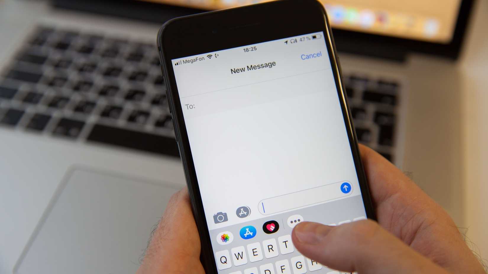 Typing a new message on an iPhone.
