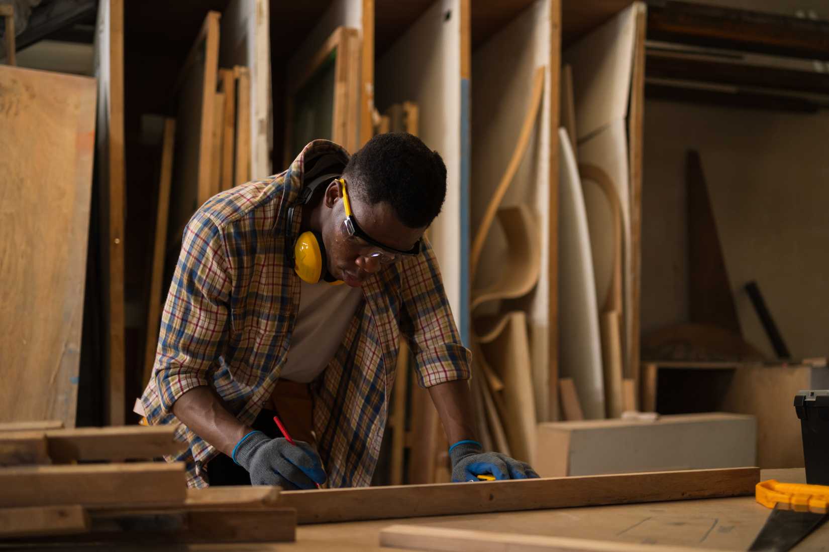 A man works on a carpentry project.