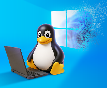 Талисман Tux за ноутбуком, а логотип Windows постепенно исчезает на фоне