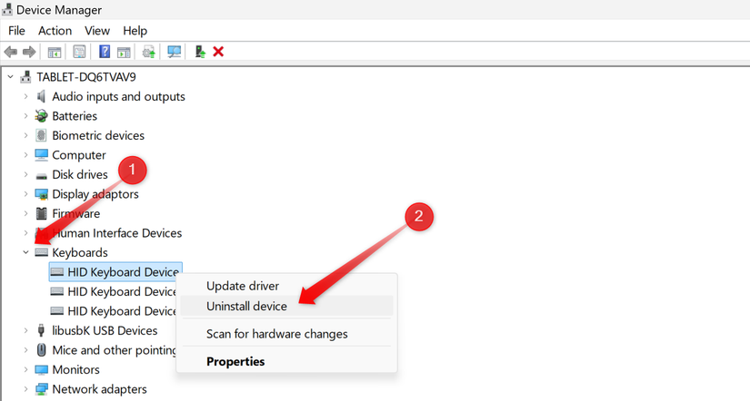 Uninstalling a keyboard device in Device Manager.