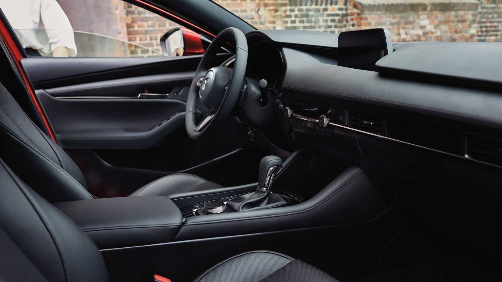 Interior shot of the dashboard in a 2021 Mazda 3