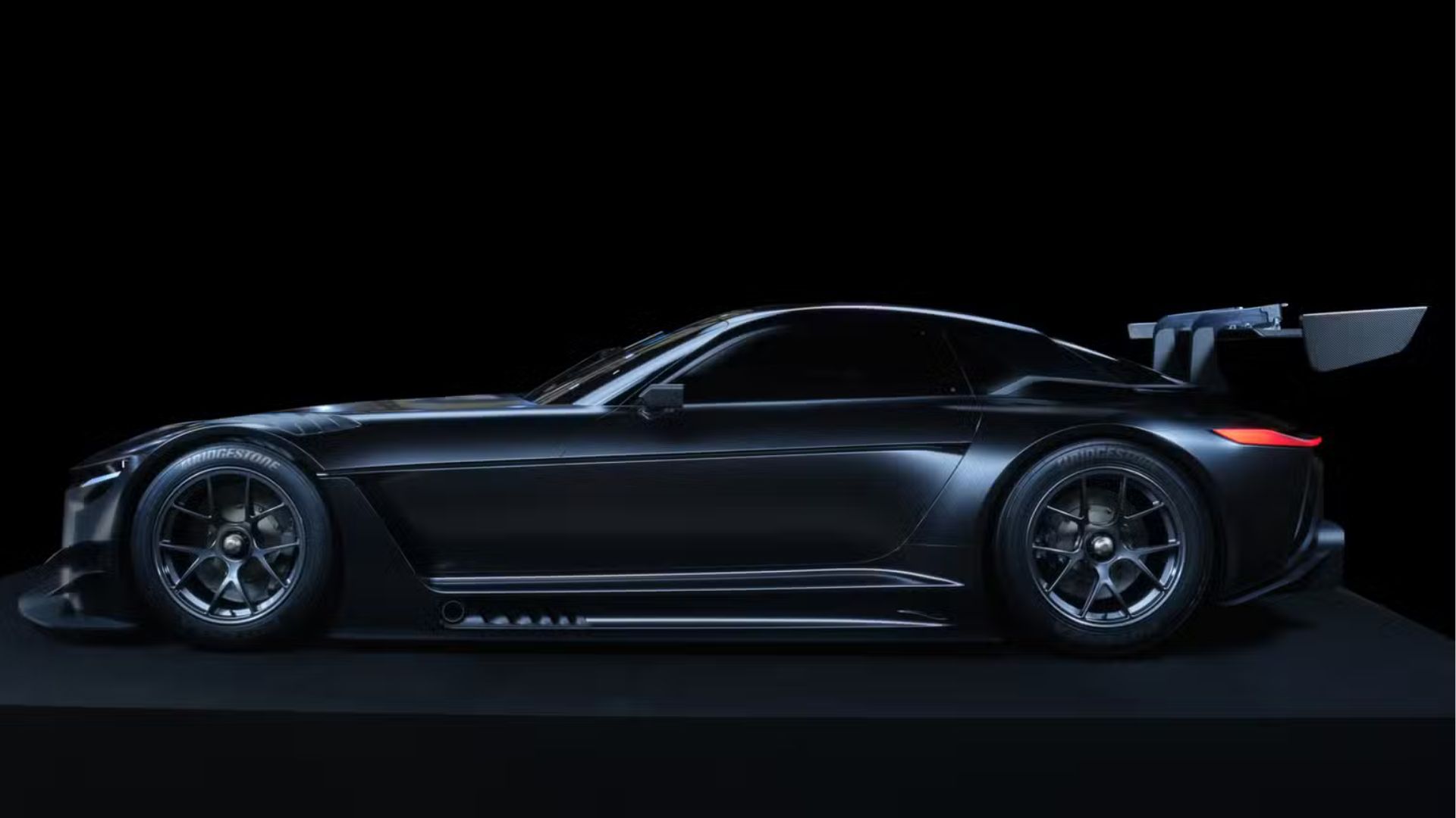 Side profile studio shot of the 2022 Toyota GR GT3 Concept.