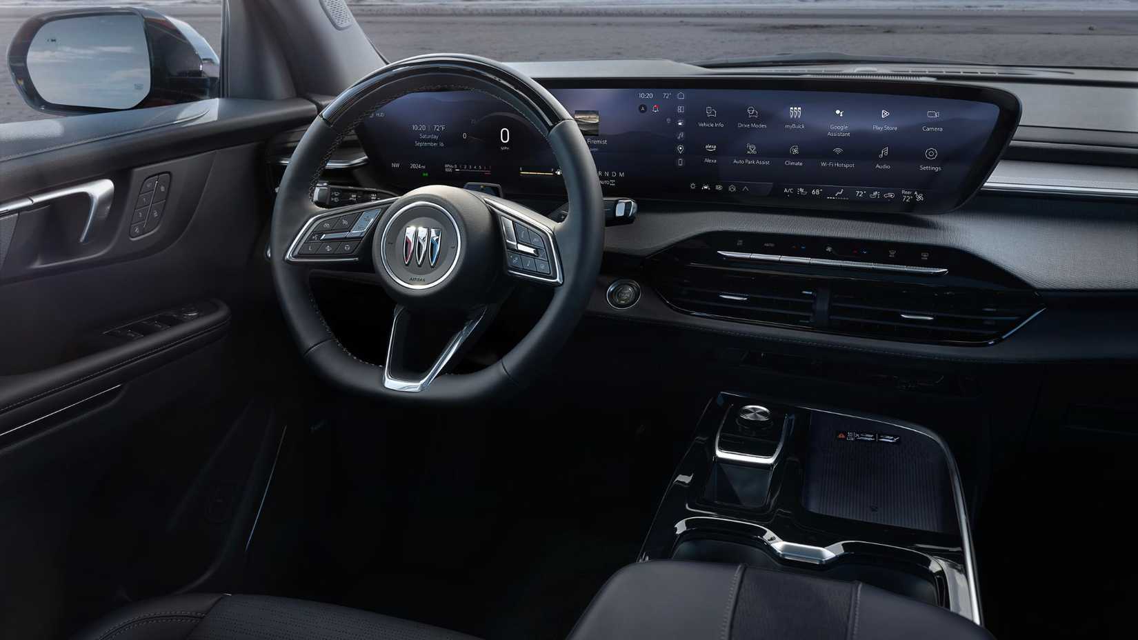 Shot of the steering wheel and infotainment screen in a 2025 Buick Enclave Sport Touring.
