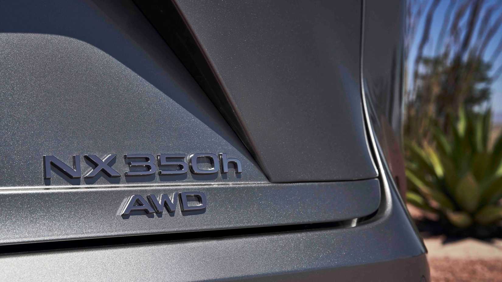 Close-up shot of the badging on the tailgate of a gray 2026 Lexus NX 350h.