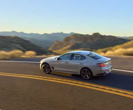 Side action shot of a 2025 Genesis G70