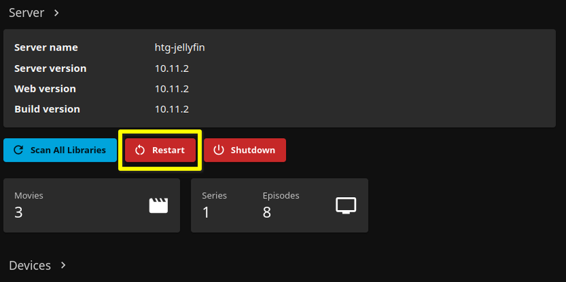 A yellow box around the Restart button on a Jellyfin server dashboard.