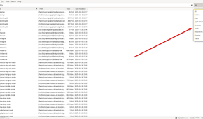 An FSearch window is displayed, and a red arrow points to the top right corner, where a drop-down list displays file class options.