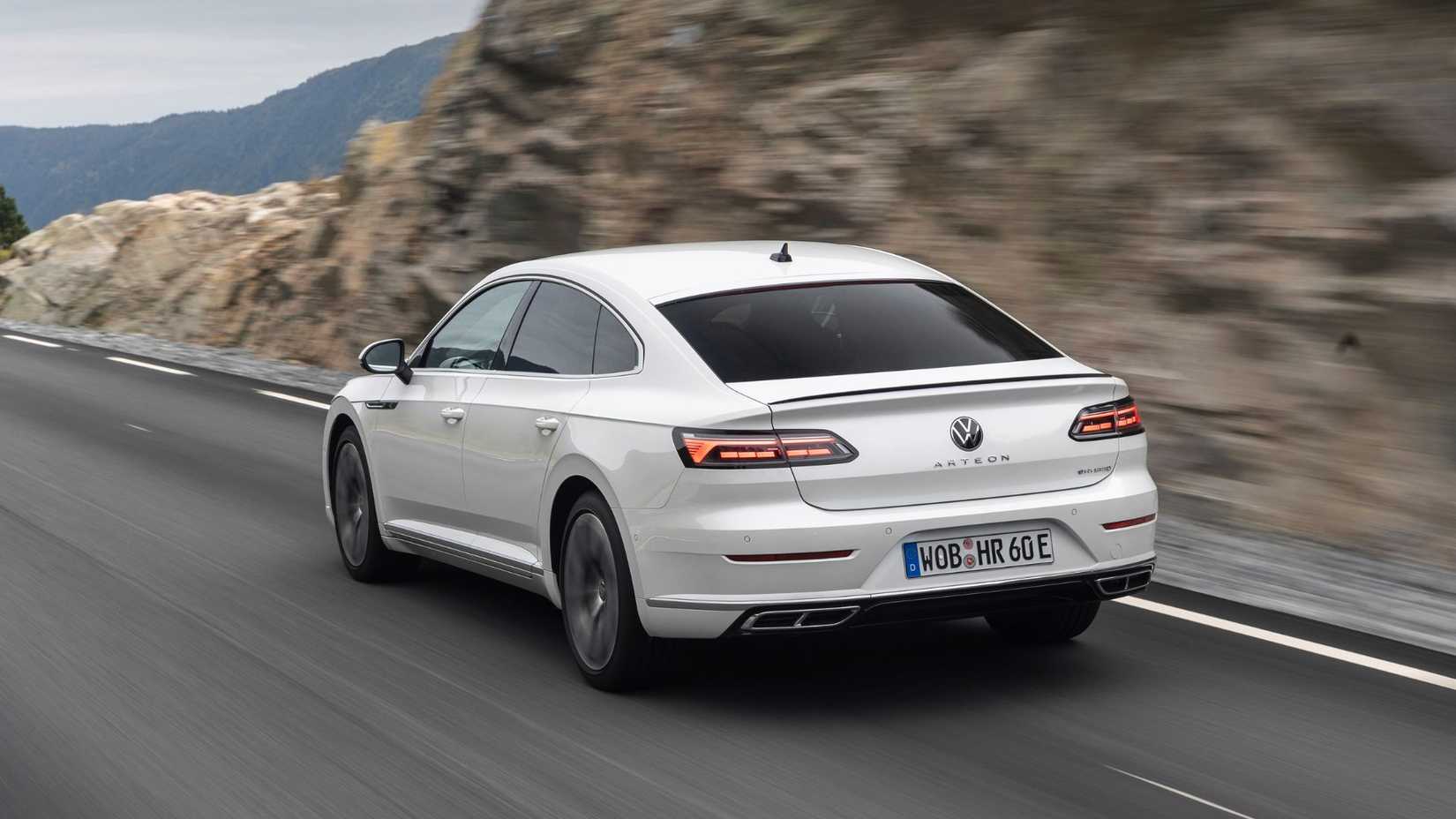 Dynamic rear 3/4 shot of a white 2021 Volkswagen Arteon.
