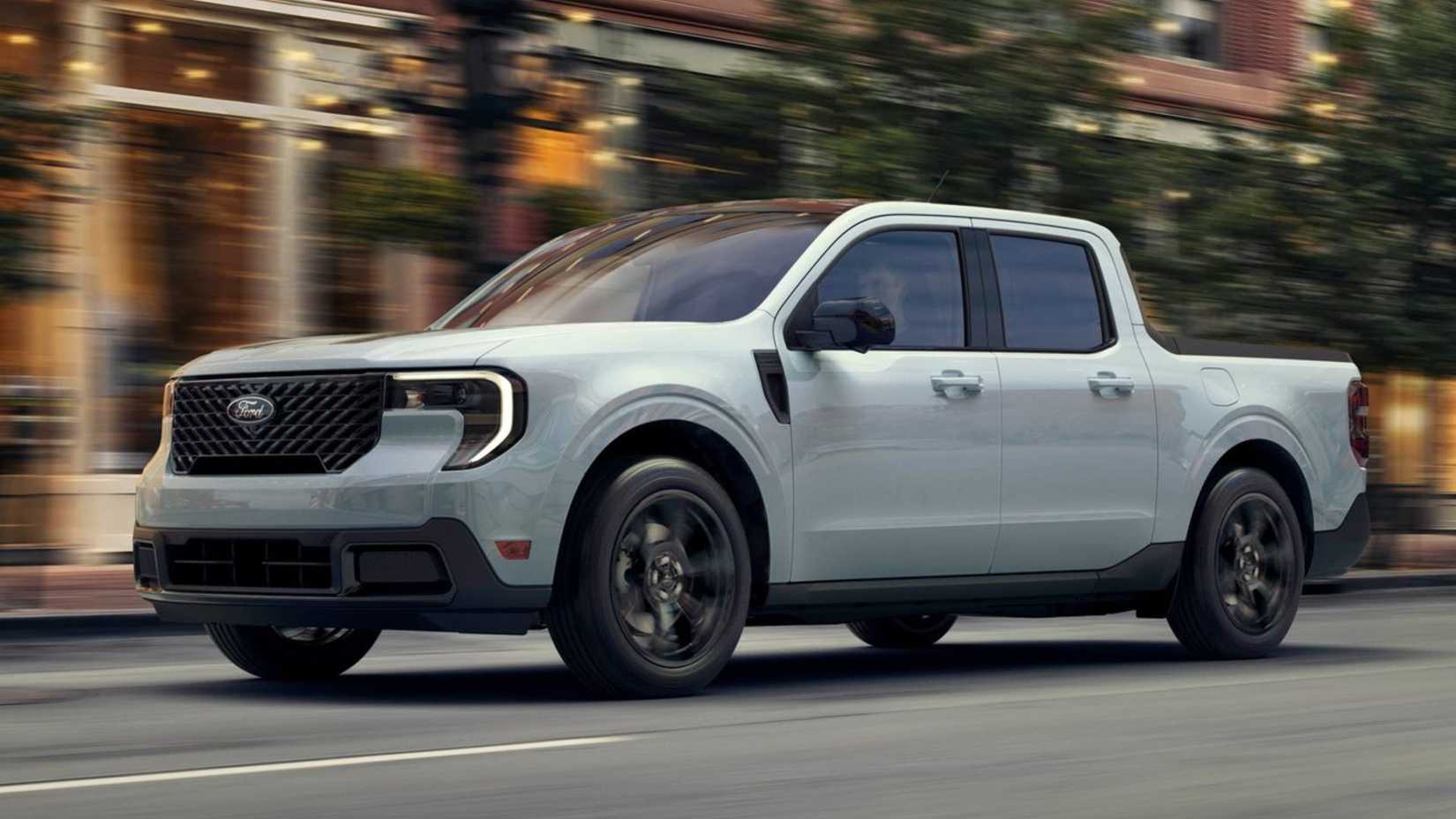 Dynamic front 3/4 shot of a white 2025 Ford Maverick driving in a city.