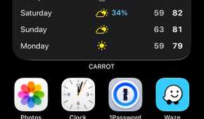 An iPhone with a solid black wallpaper.