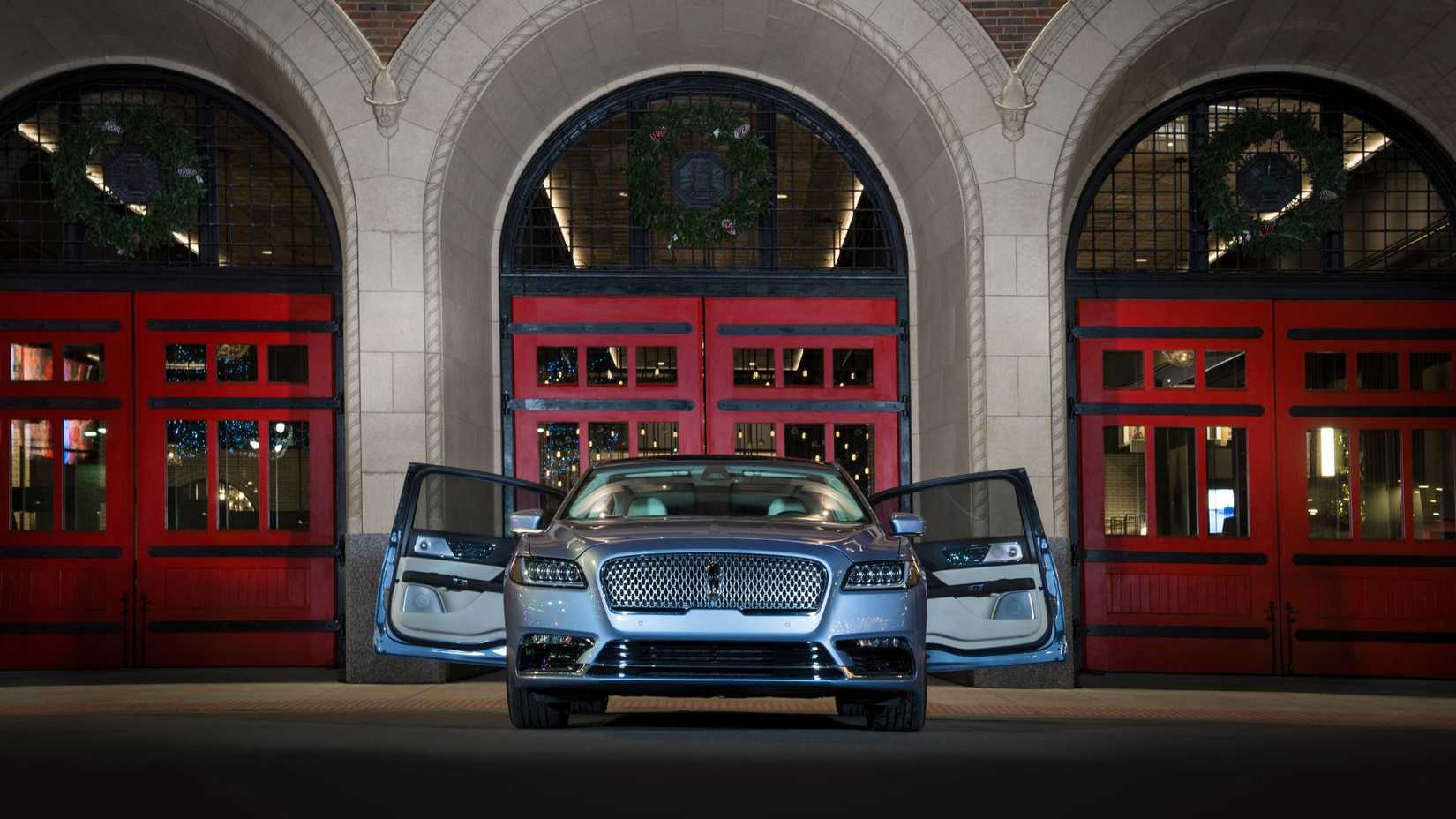 Static front-end shot of a Lincoln Continental Coach Doors.