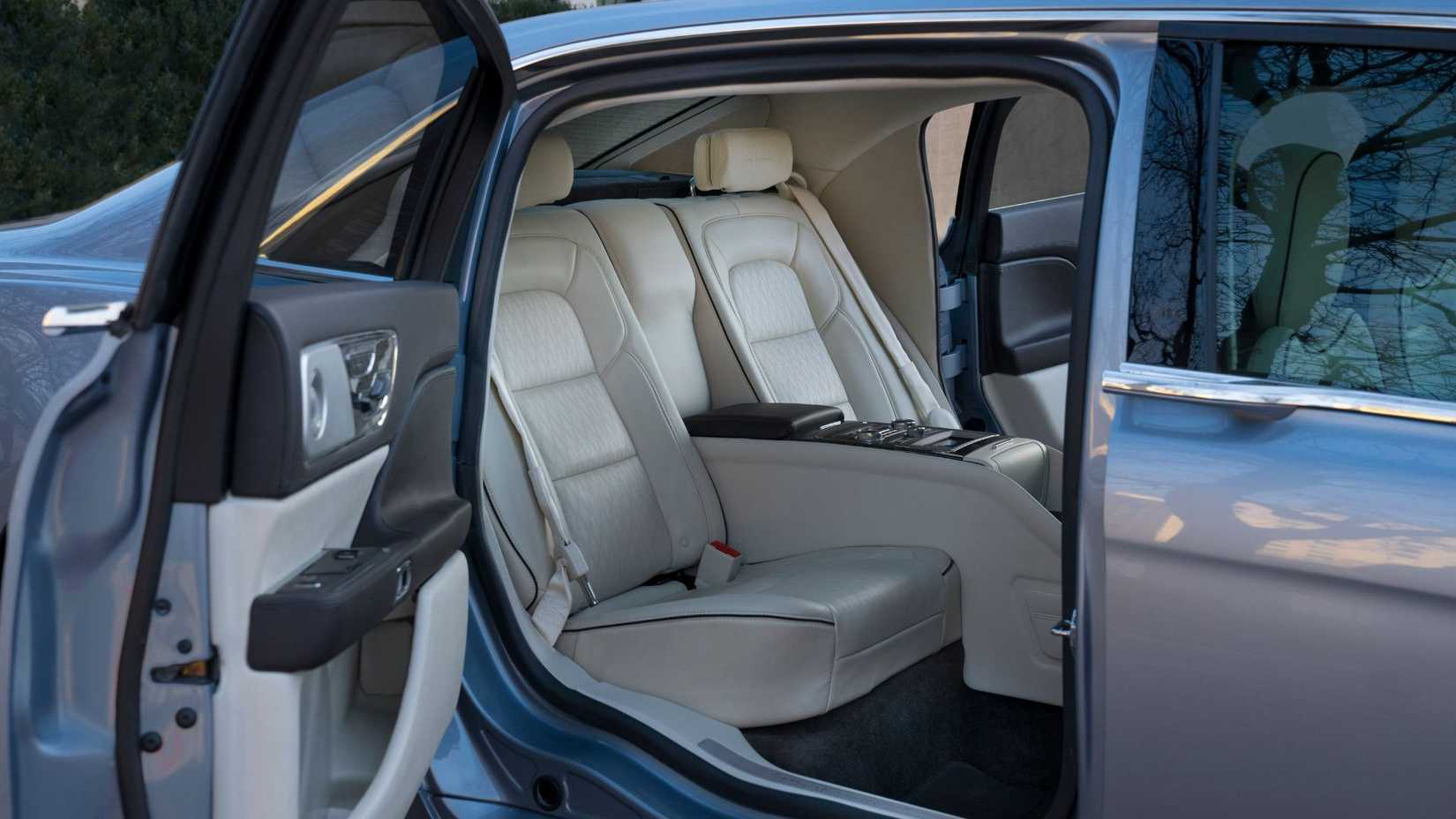 Close-up shot of the rear-seat space in a Lincoln Continental Coach Doors.