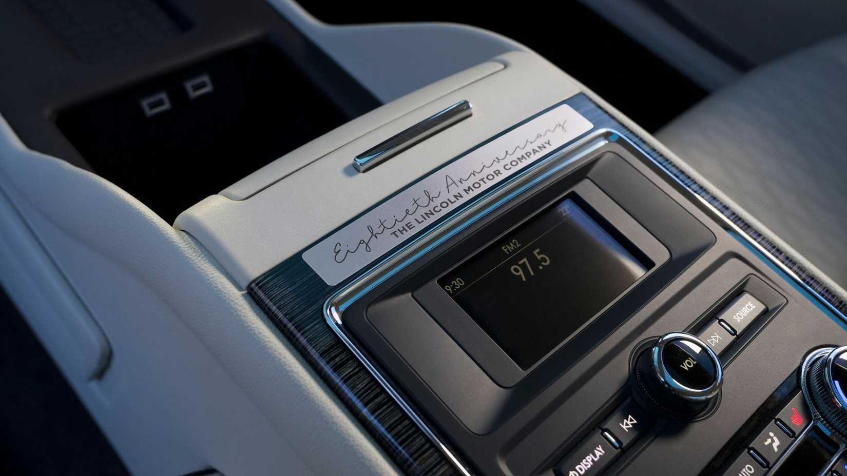 Close-up shot of the rear-seat controls in a Lincoln Continental Coach Doors.