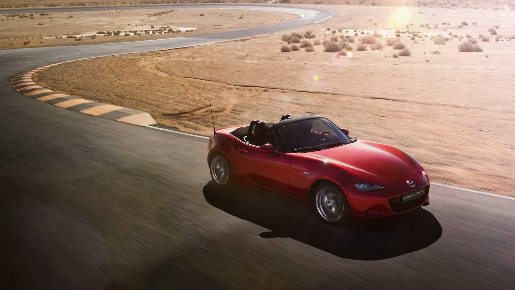 Front 3/4 action shot of a 2016 Mazda MX-5