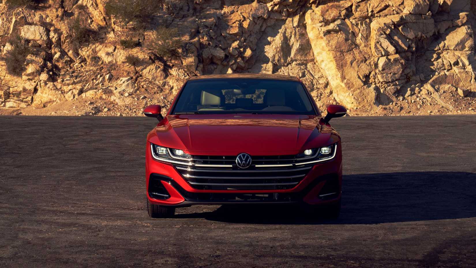 Static front-end shot of a red 2021 Volkswagen Arteon.
