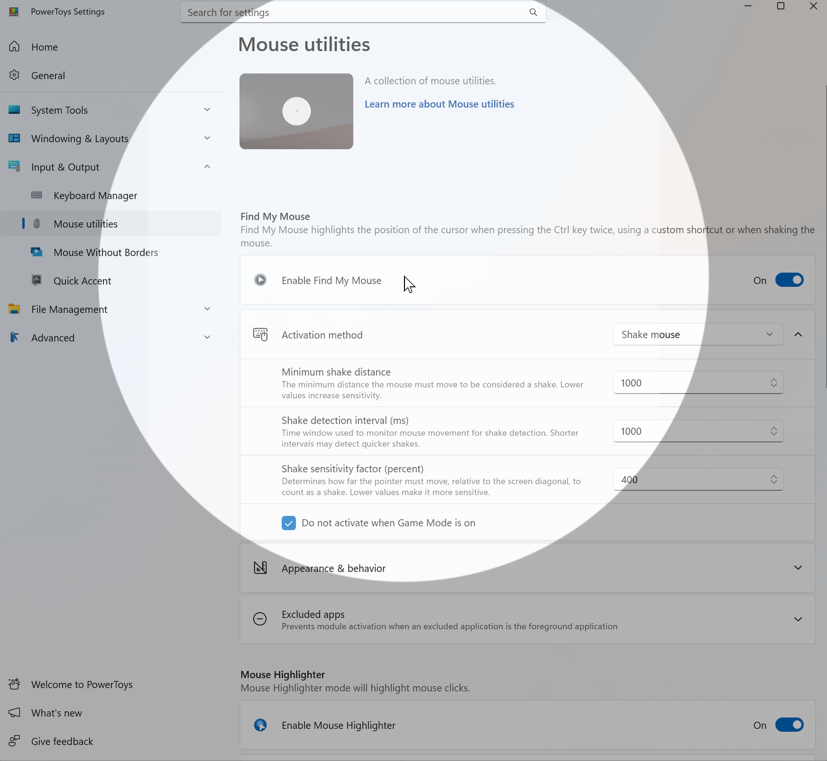 A screenshot of the PowerToys utility, Find My Mouse. Its activated creating a circle around the mouse's location.