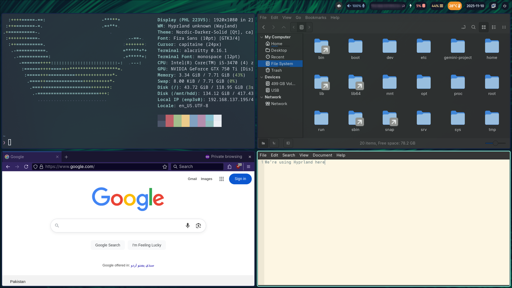 Tiling four windows side by side in Hyprland.