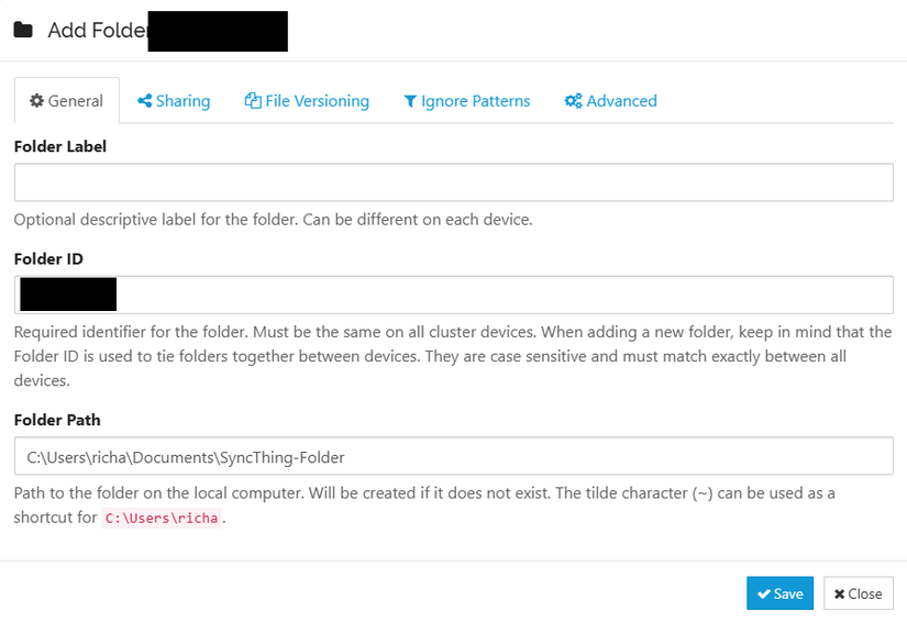 A screenshot of Syncthing's set up dialog, where a user picks their Synch folder and names it.