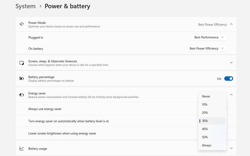 Turn energy saver on autamatically when battery level is at option in windows settings.