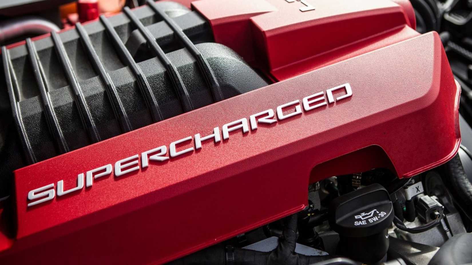 Close-up shot of the engine under the hood of a 2014 Vauxhall VXR8.