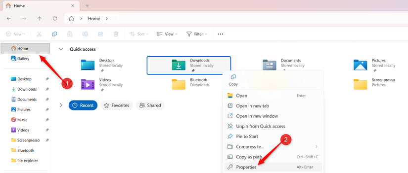 Checking the space occupied by the Downloads folder in File Explorer.