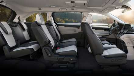 Shot inside the cabin of a 2025 Honda Odyssey showing its three rows of seating.