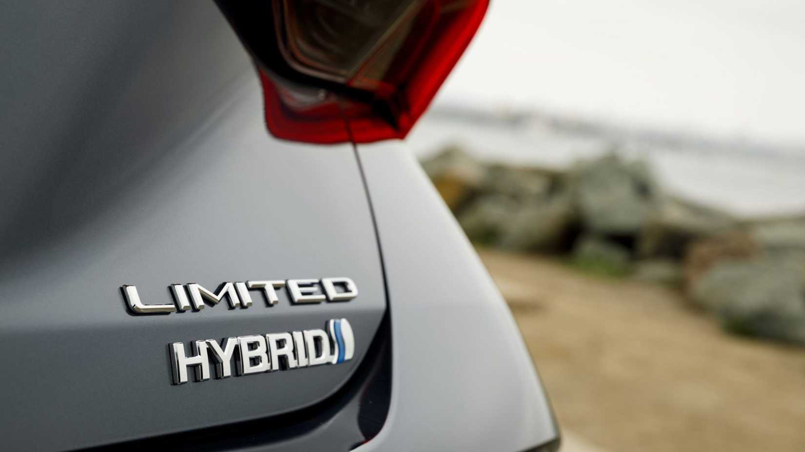 Close-up shot of the badging on the tailgate of a gray 2022 Toyota Avalon Hybrid Limited.