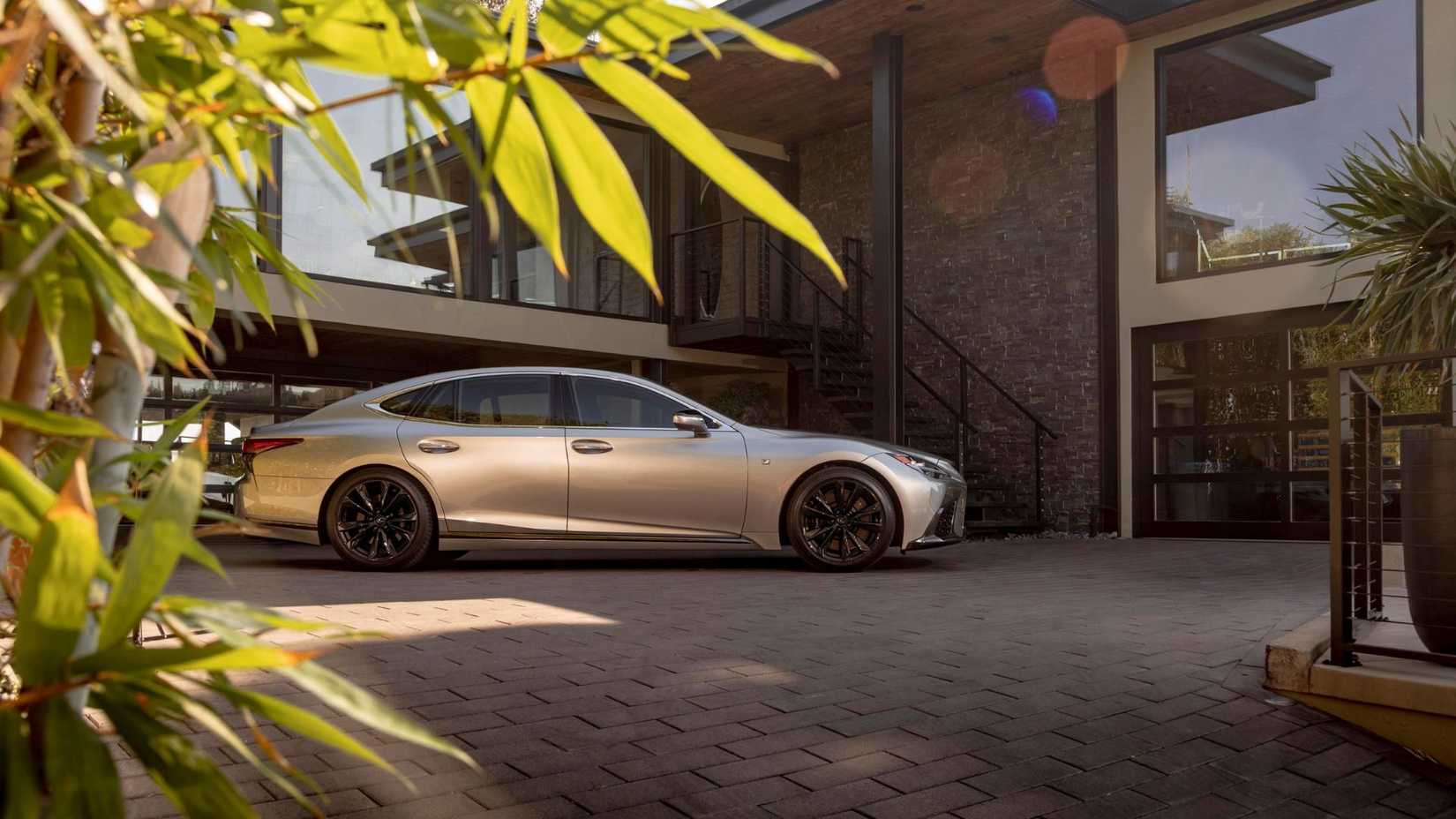 Static side profile shot of a silver 2025 Lexus LS 500.