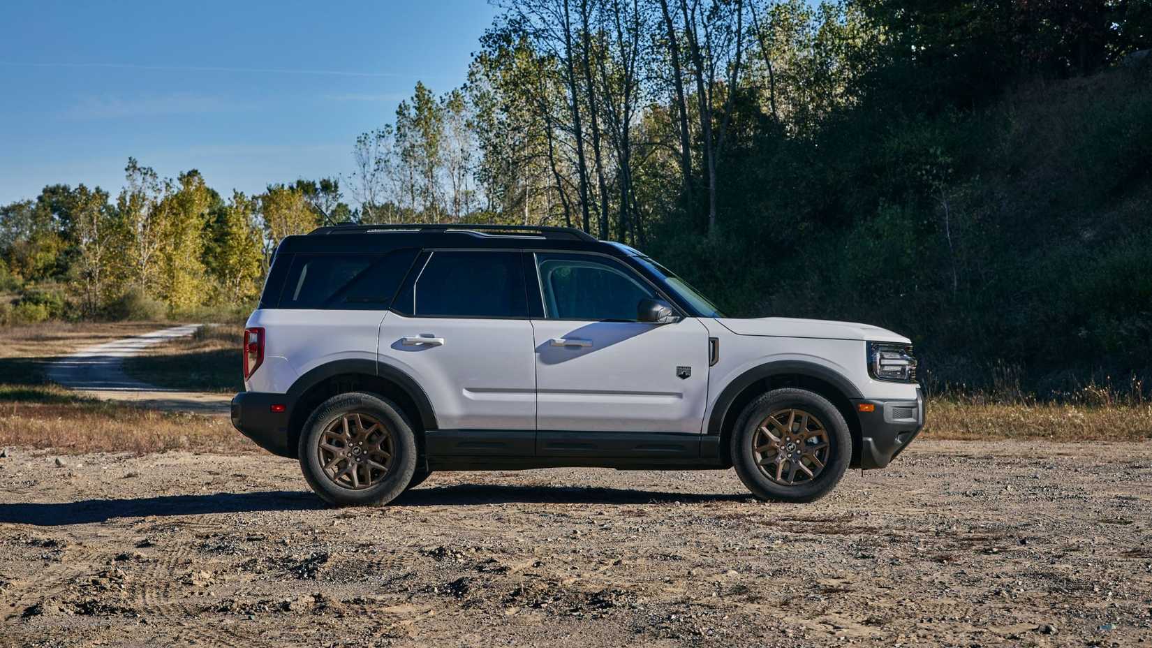 Static side profile shot of a white 2026 Bronco Sport Bronze Package.