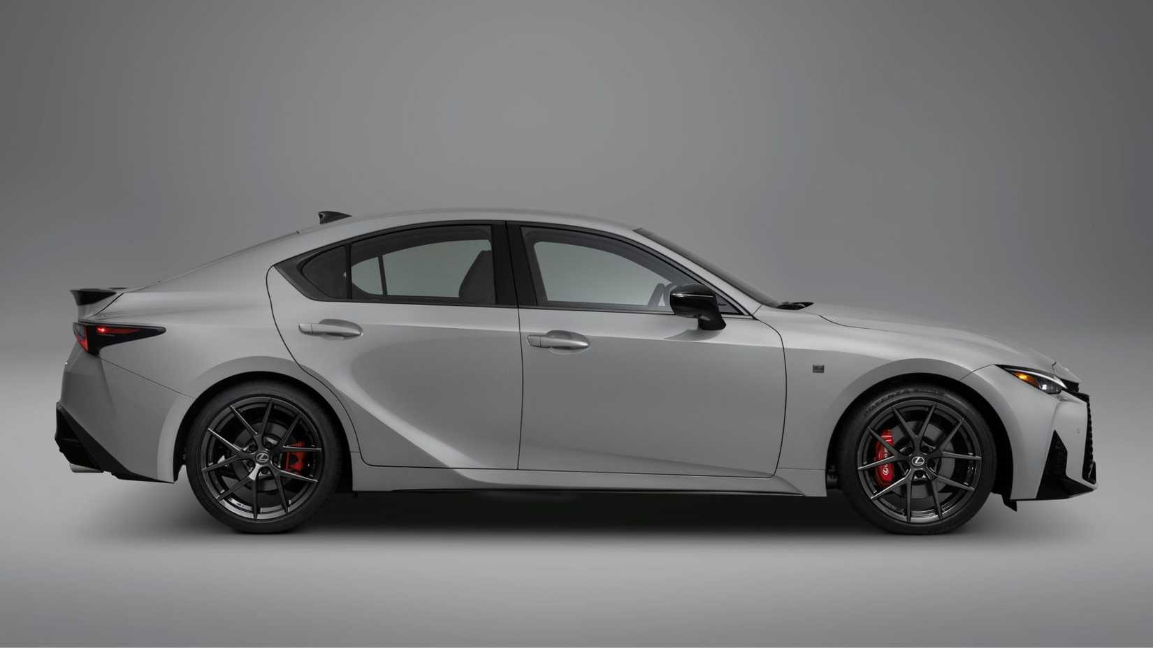 Static side profile shot of a gray 2026 Lexus IS 350.