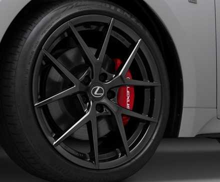 Close-up shot of the alloy wheel on a gray 2026 Lexus IS 350.