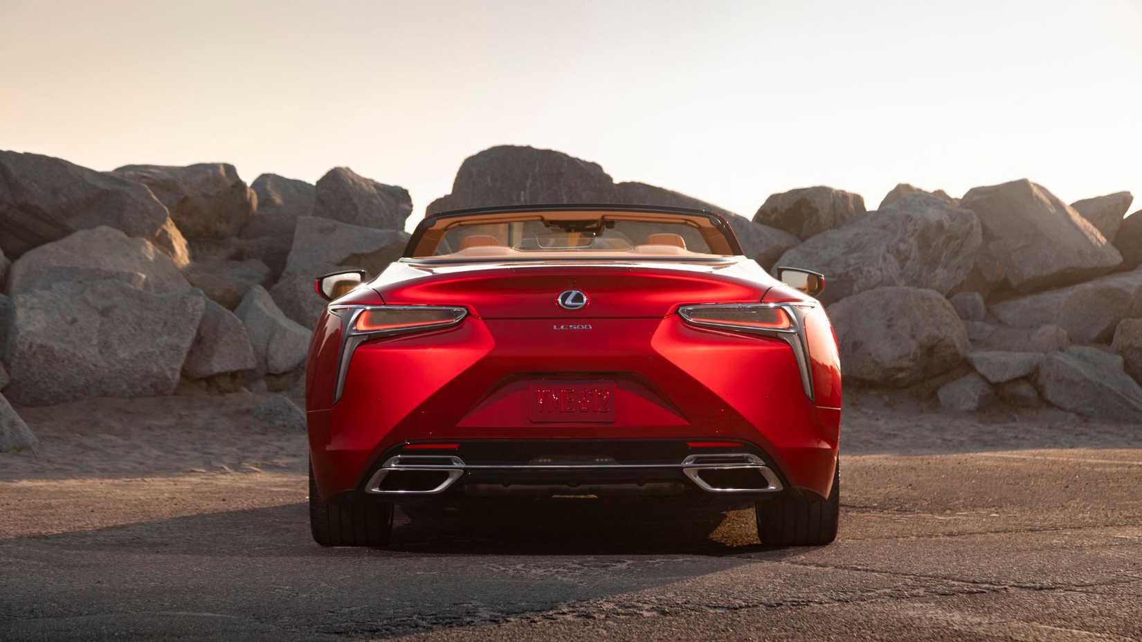 A still shot of the rear of a red 2026 Lexus LC 500 convertible.