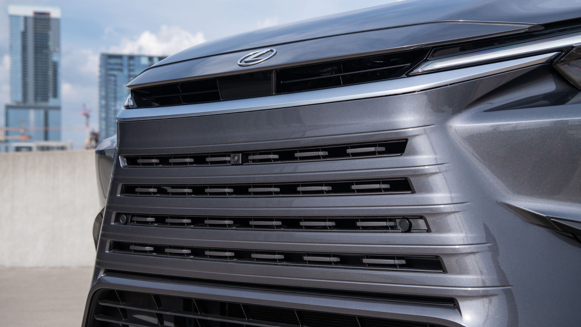 Close-up of the grille of a 2026 Lexus TX 350 Premium.
