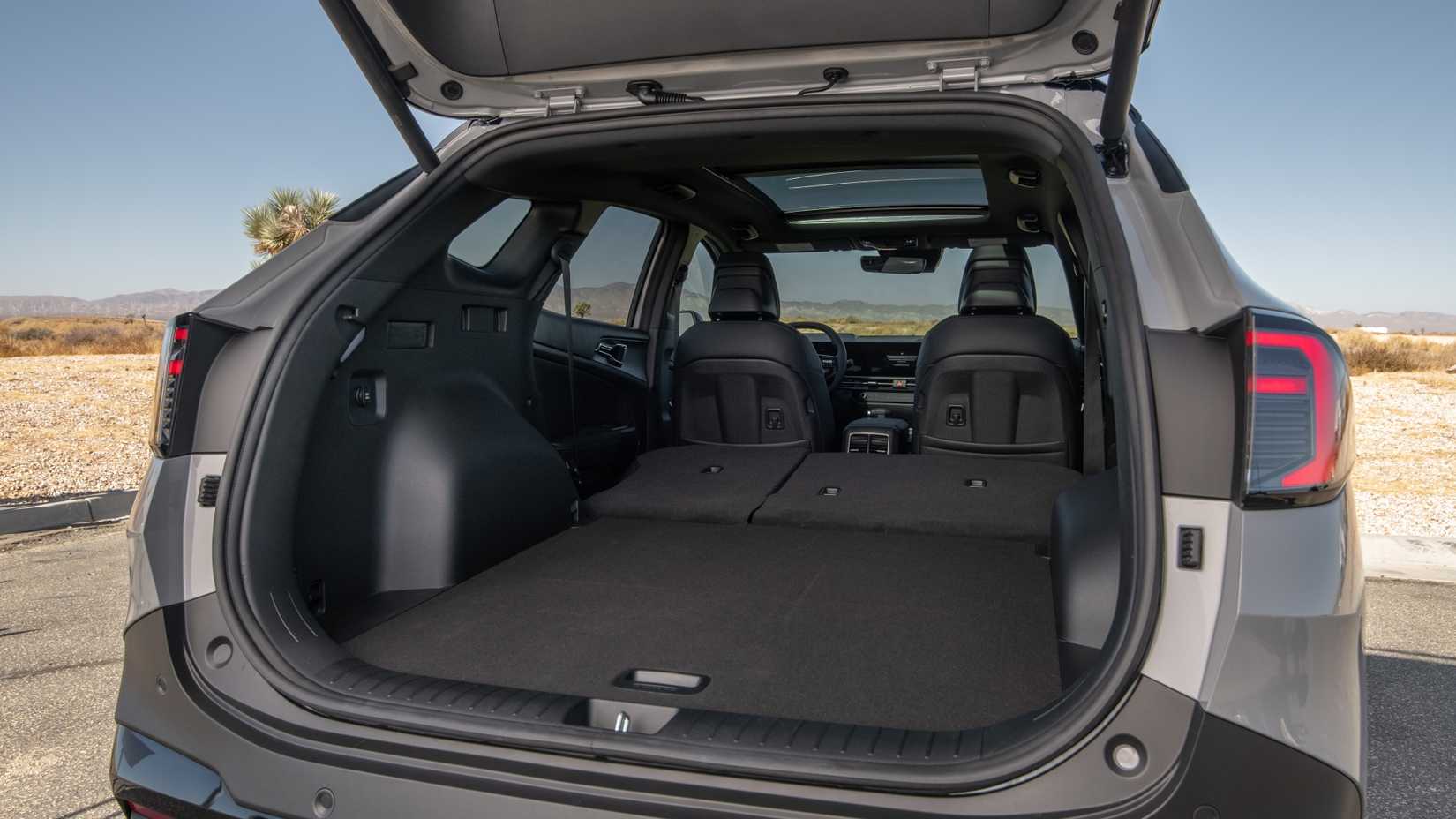 A shot of the open trunk of the 2026 Kia Sportage