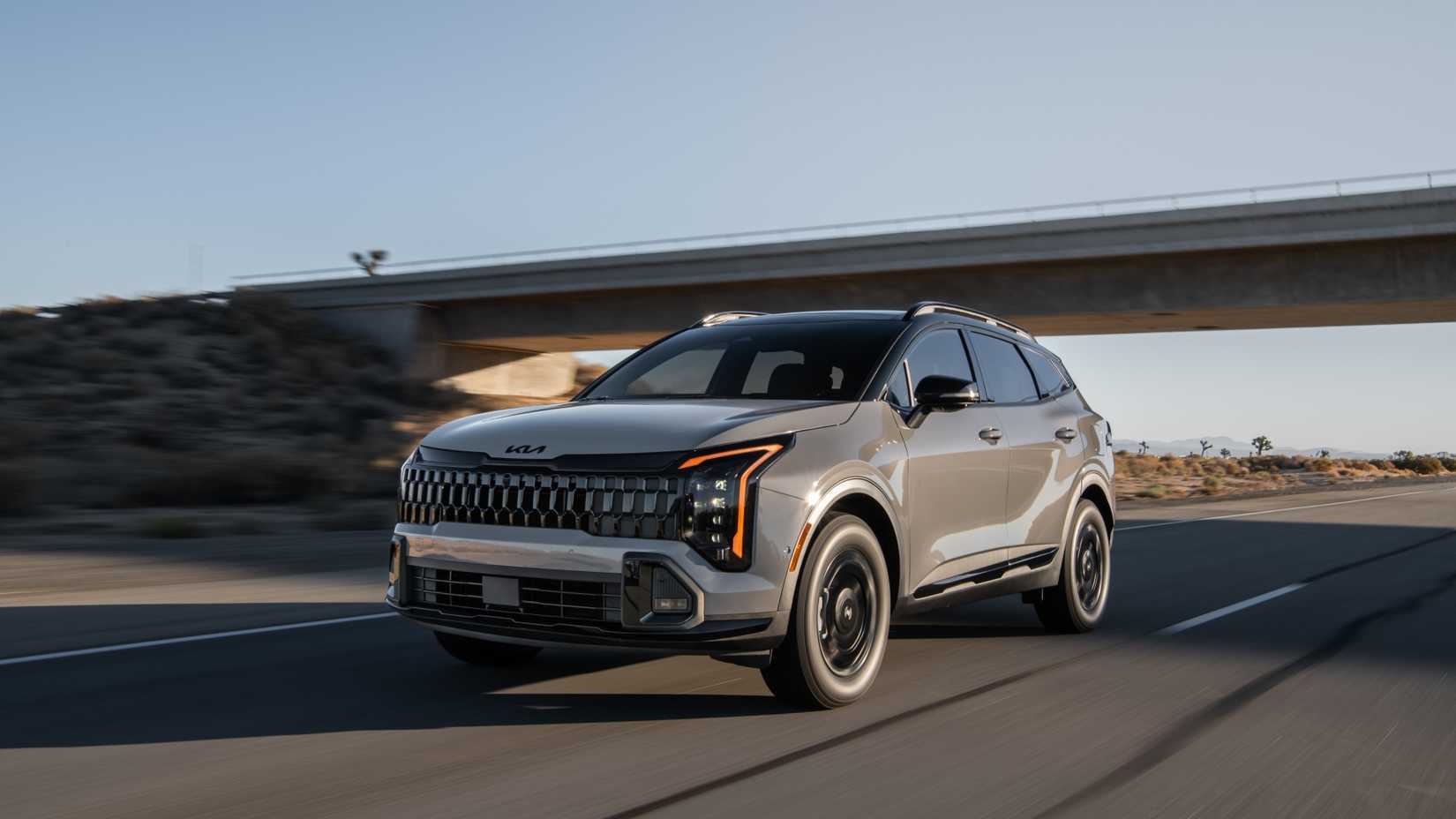 Plan 3/4 avant d'un Kia Sportage 2026