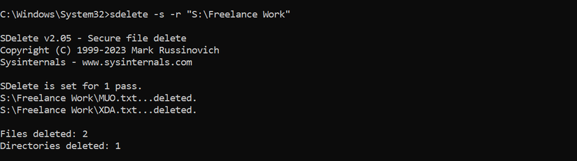 Deleting a folder containing two files using the sdelete command at the command prompt.