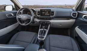Shot of the dashboard and interior inside a 2026 Hyundai Venue.
