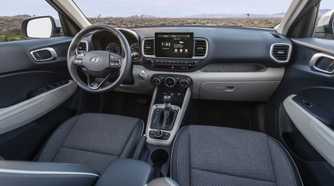 Shot of the dashboard and interior inside a 2026 Hyundai Venue.