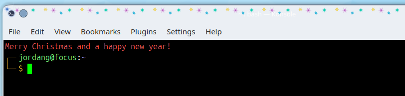 Uma saudação de feriado no topo de uma nova sessão do terminal Konsole.