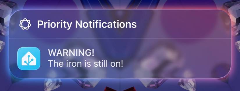 A Home Assistant notificiation on an iPhone warning that the iron is still on.