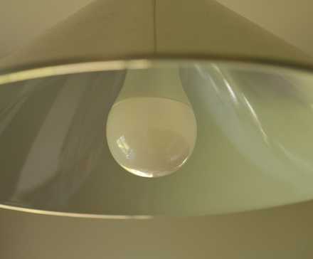 IKEA Tradfri smart bulb in a kitchen overhead light.-1