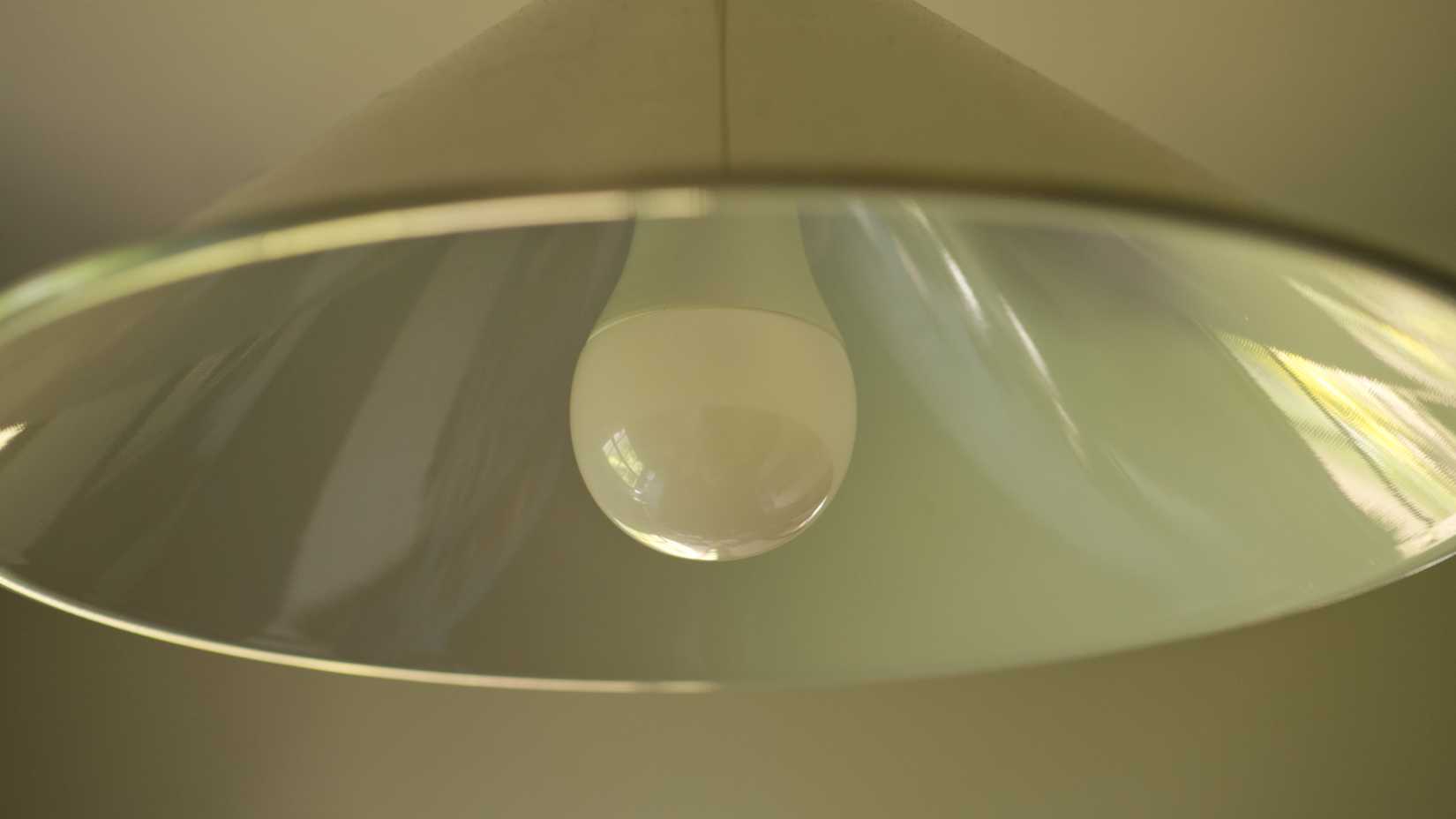 IKEA Tradfri smart bulb in a kitchen overhead light.