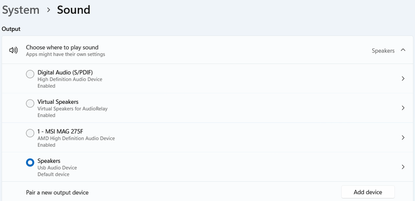 Selecionando o dispositivo de saída de áudio correto nas configurações de som.