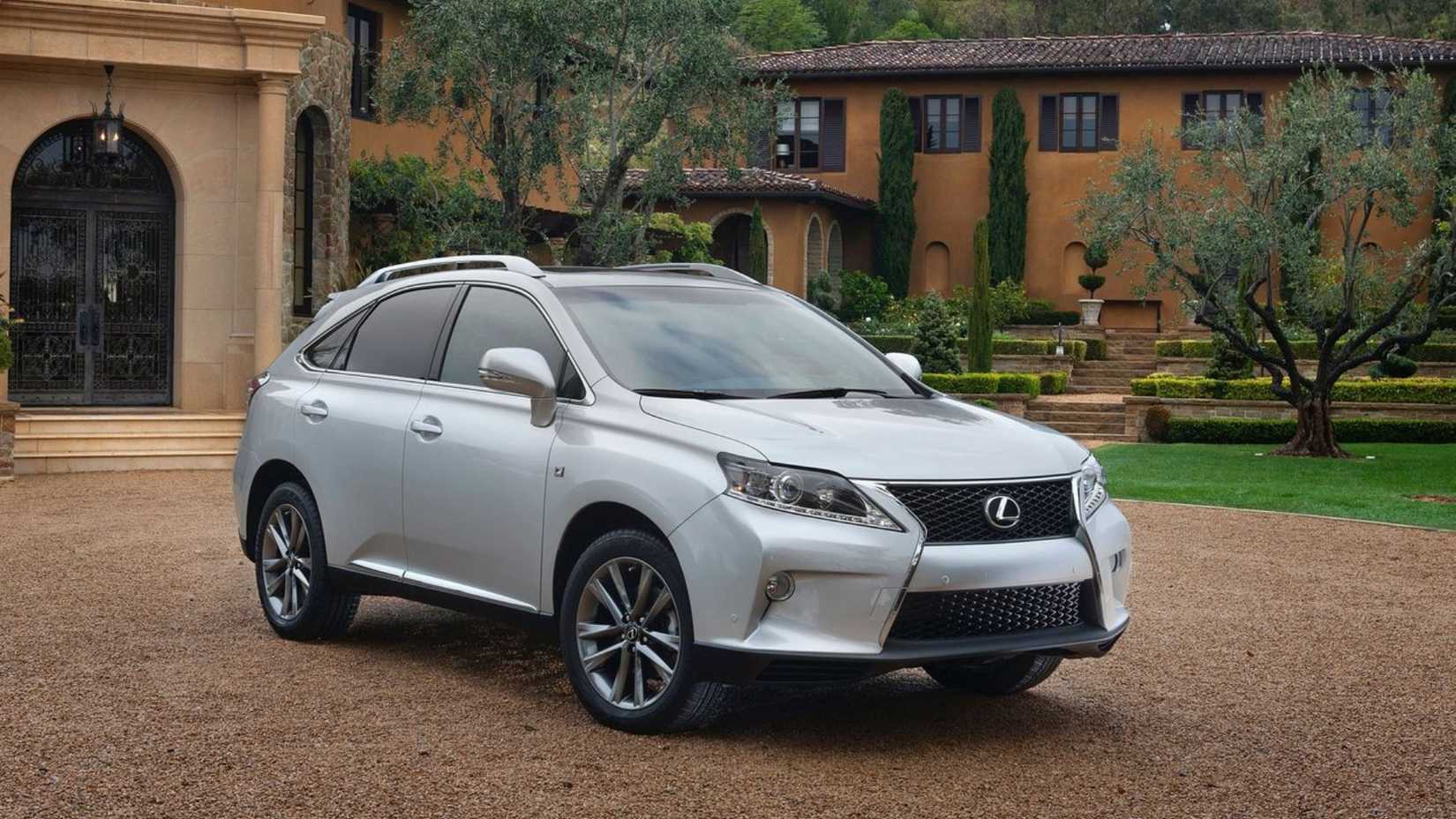 Static 3/4 front shot of a silver 2013 Lexus RX 350 F Sport.