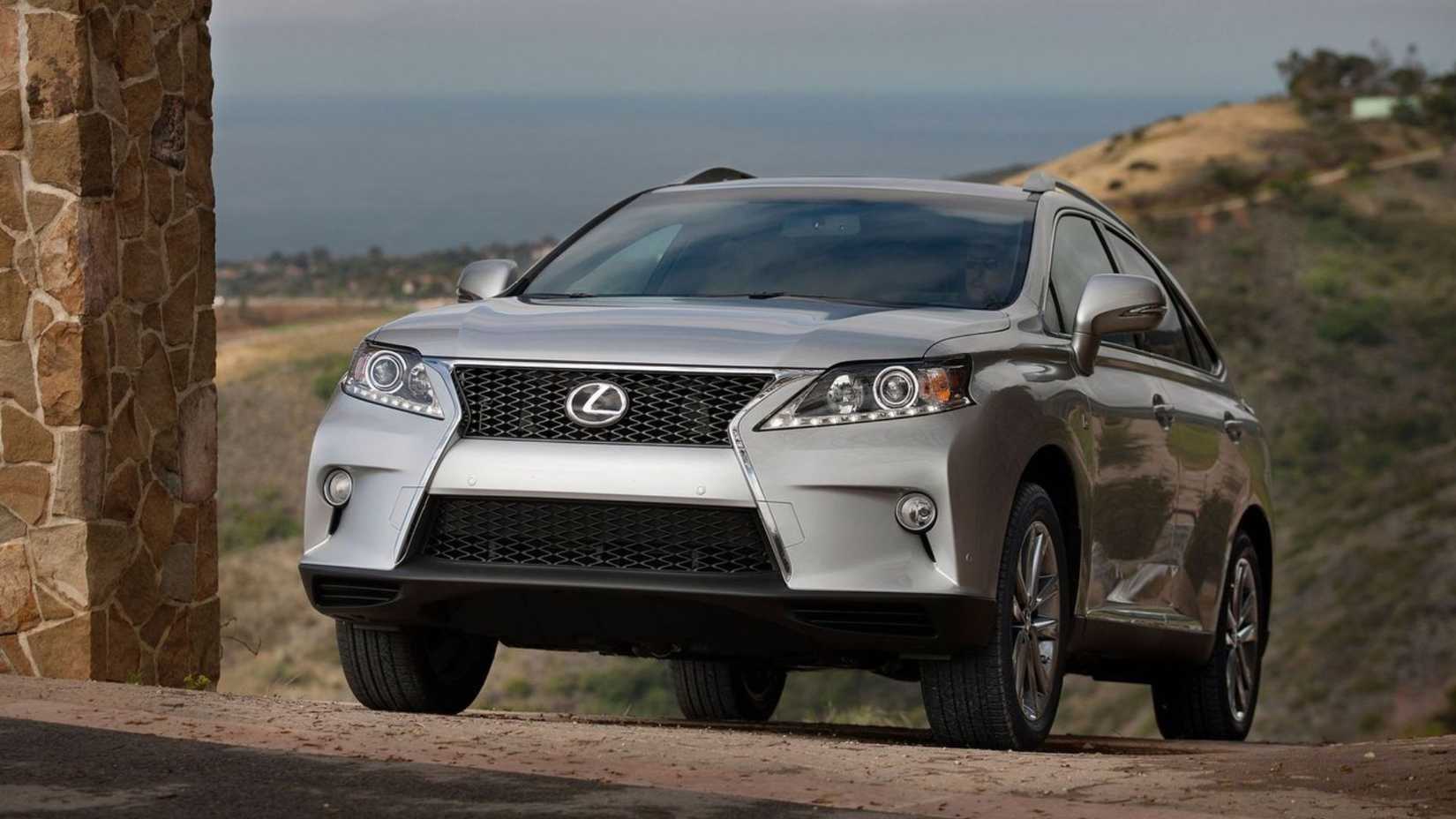 Static 3/4 front shot of a silver 2013 Lexus RX 350 F Sport.